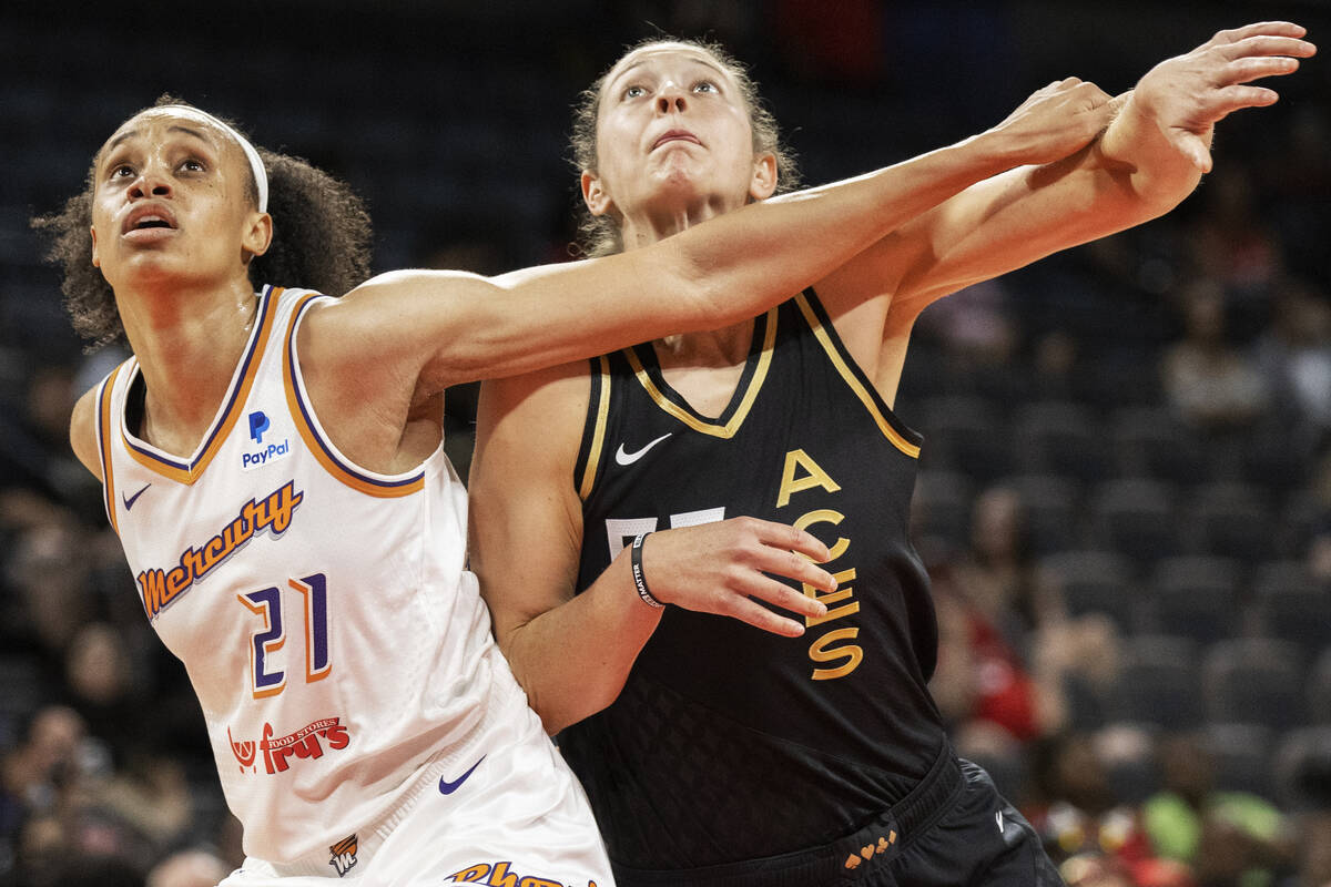 Phoenix Mercury forward Brianna Turner (21) boxes out Aces forward Theresa Plaisance (55) in th ...