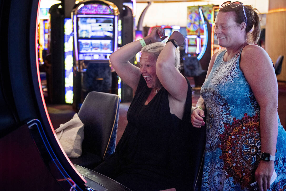 Chastity Irwin, left, and Kaycee Goings, of Dayton, Ohio, play the slot machines at Circa on Th ...