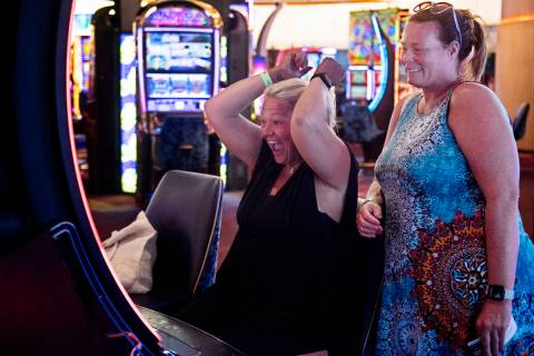 Chastity Irwin, left, and Kaycee Goings, of Dayton, Ohio, play the slot machines at Circa on Th ...