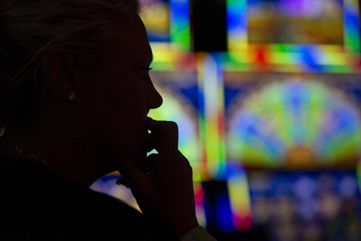 Chastity Irwin, of Dayton, Ohio, plays the slot machines at Circa on Thursday, May 19, 2022, in ...