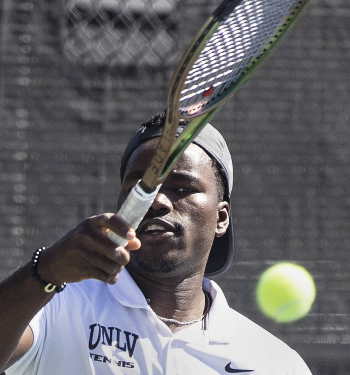 UNLV senior tennis player Christopher Bulus returns the ball during practice at Frank and Vicki ...