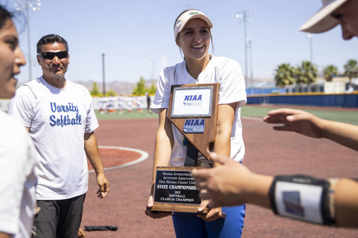 Green Valley's Avari Morris (11) holds a trophy after defeating Douglas in the Class 5A state s ...