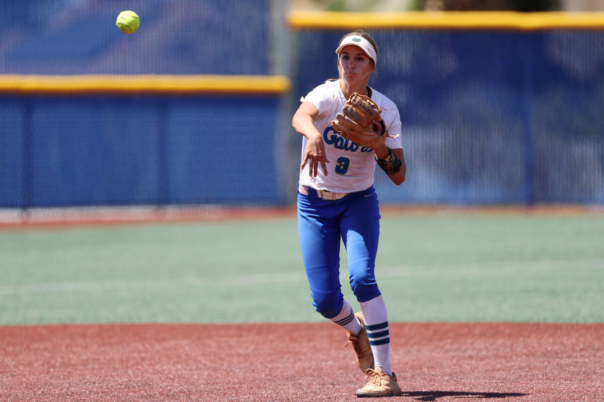 Green Valley's Michaela Morris (3) throws to first base for an out during the Class 5A state so ...