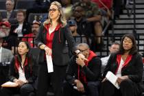 Las Vegas Aces head coach Becky Hammon, front, shouts to her team from the sideline during the ...