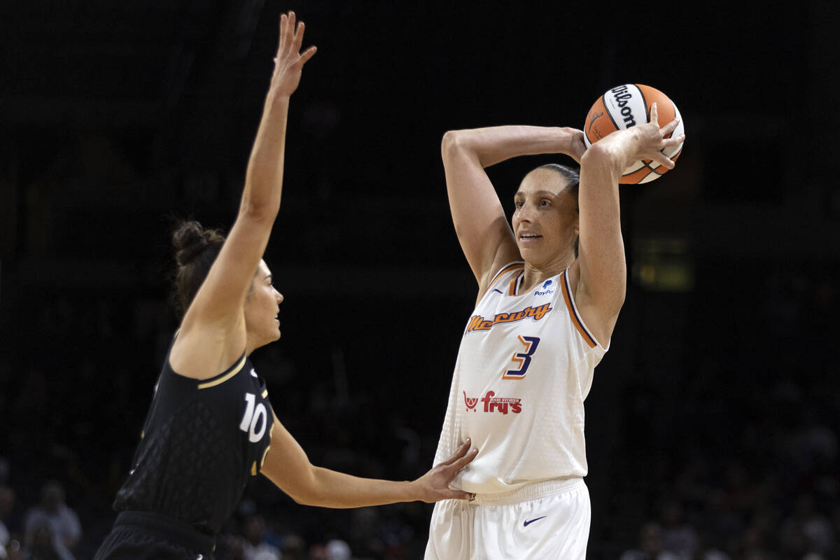 Phoenix Mercury guard Diana Taurasi (3) looks to pass while Las Vegas Aces guard Kelsey Plum (1 ...