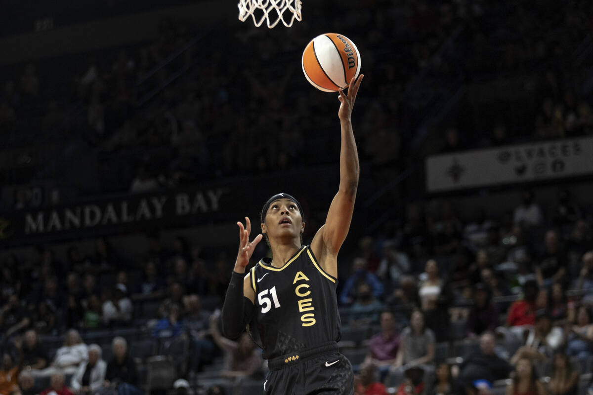 Las Vegas Aces guard Sydney Colson (51) shoots a layup during the second half of a WNBA basketb ...