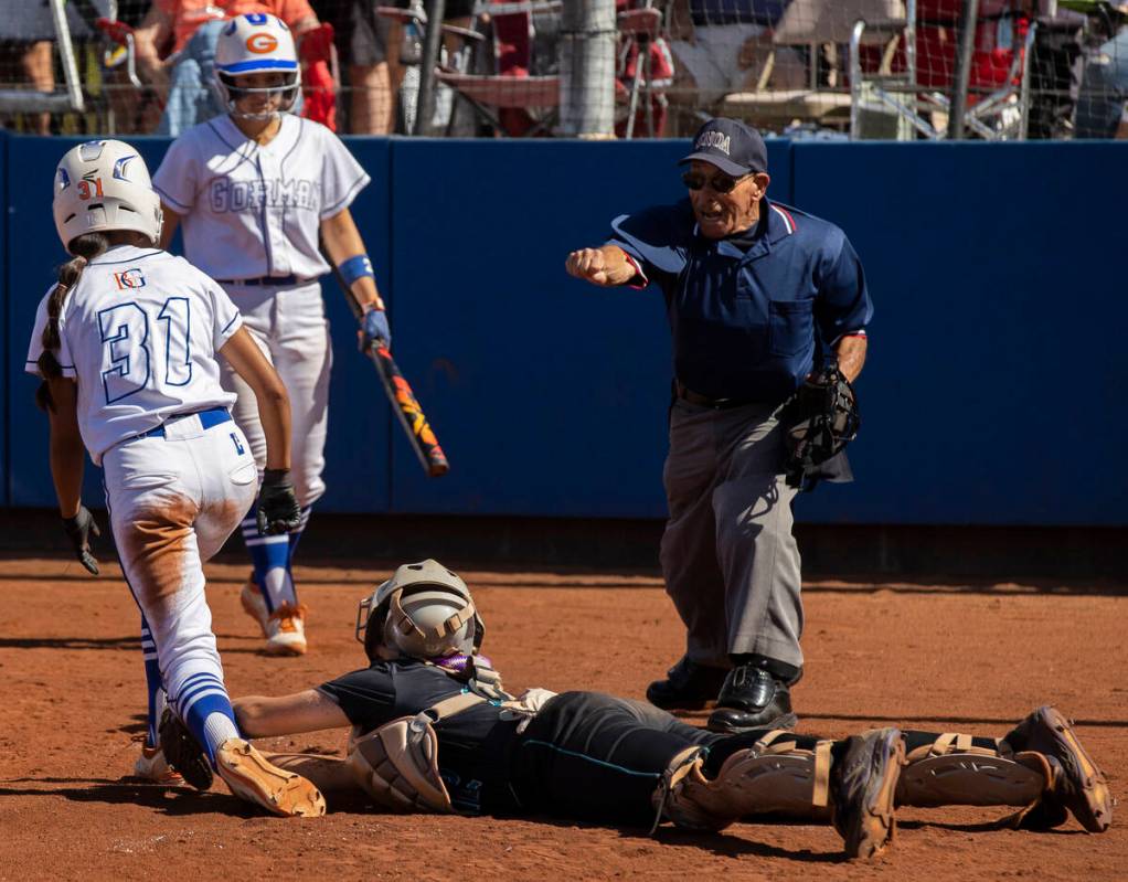 Bishop Gorman’s Brooklyn Hicks (31) is tagged out by Silverado’s Lyndia Simpkins ...
