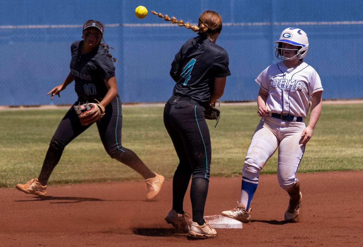 Bishop Gorman’s Olivia Bailey (3) beats the throw to second base intended for Silverado& ...