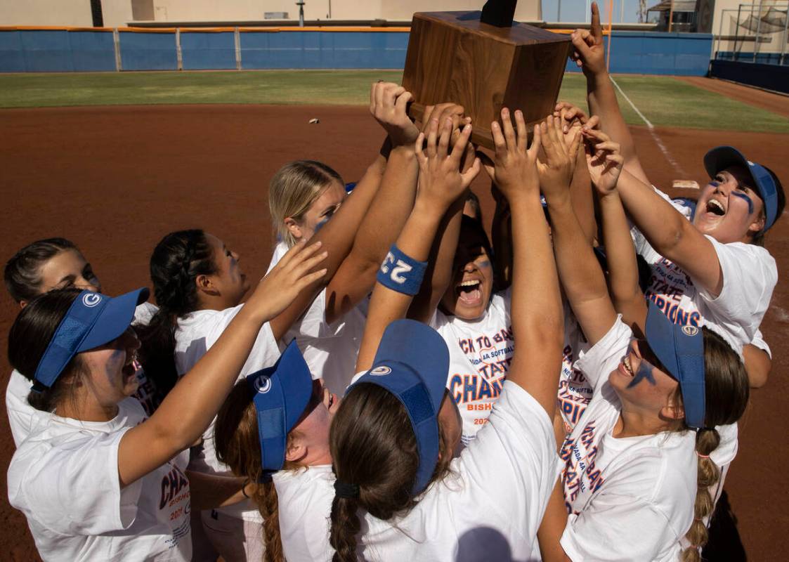 Bishop Gorman players celebrates after beating Silverado to win the Class 4A state softball cha ...