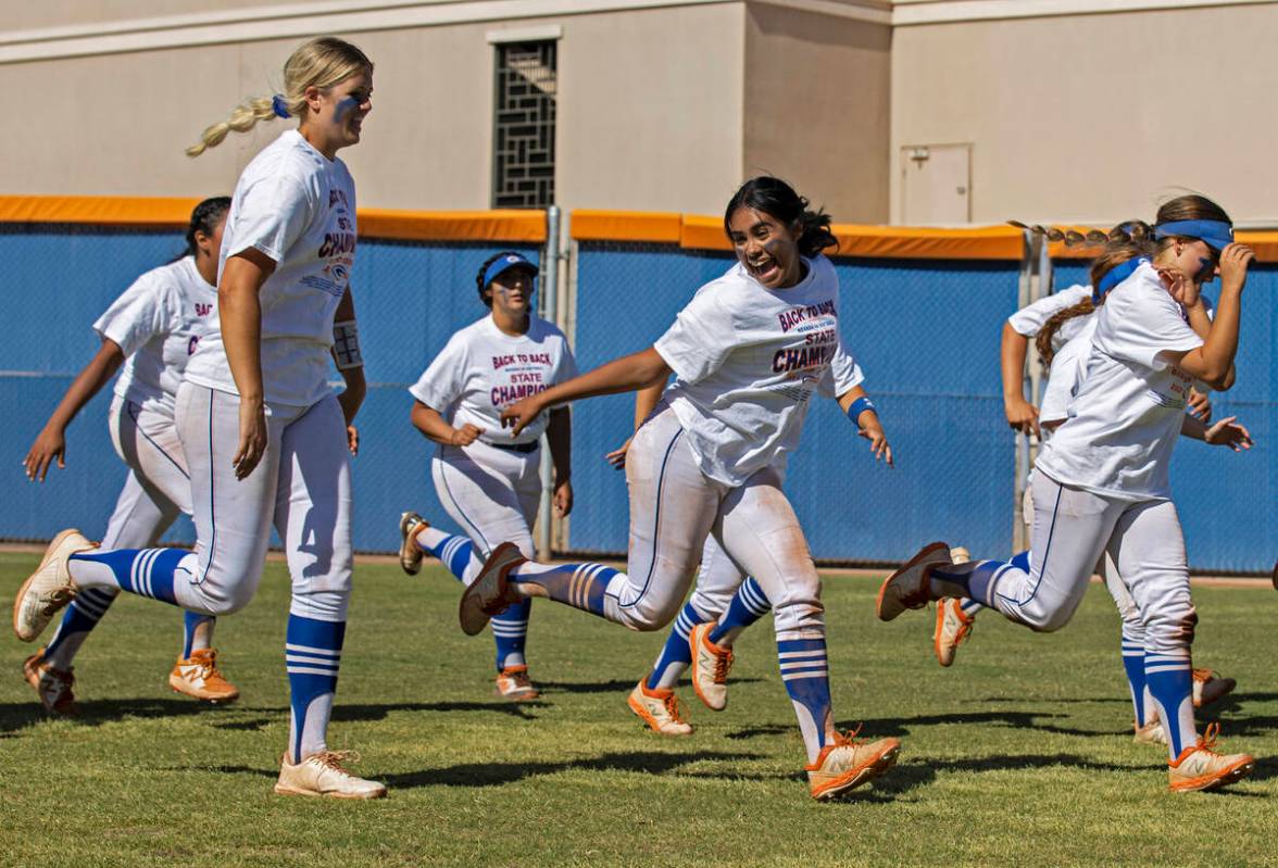 Bishop Gorman players do a celebratory lap after beating Silverado to win the Class 4A state so ...