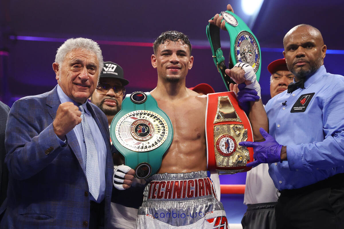 Jamaine Ortiz poses after his unanimous decision win against Jamel Herring in a lightweight ti ...