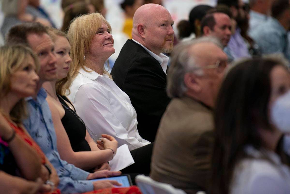 Diane Martinez, wife of the late Reynaldo Martinez, smiles during a tribute to her husband at R ...