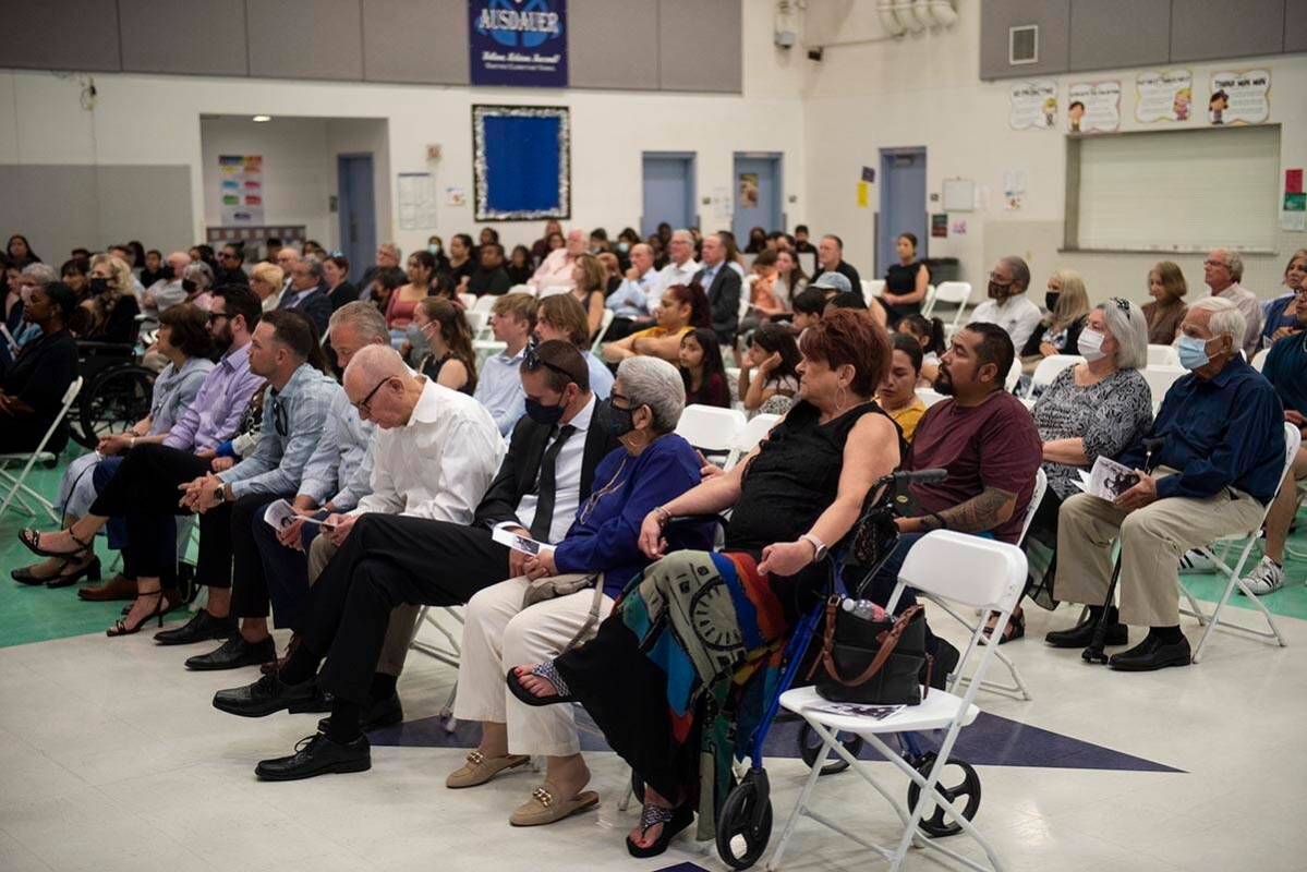 Friends, family and community members gather at Reynaldo Martinez Elementary School to honor it ...