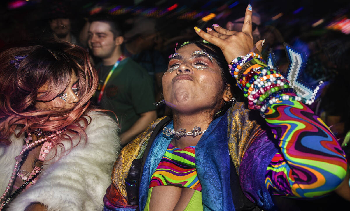 Attendees listen to music at Base Pod during day three of Electric Daisy Carnival on Sunday, Ma ...