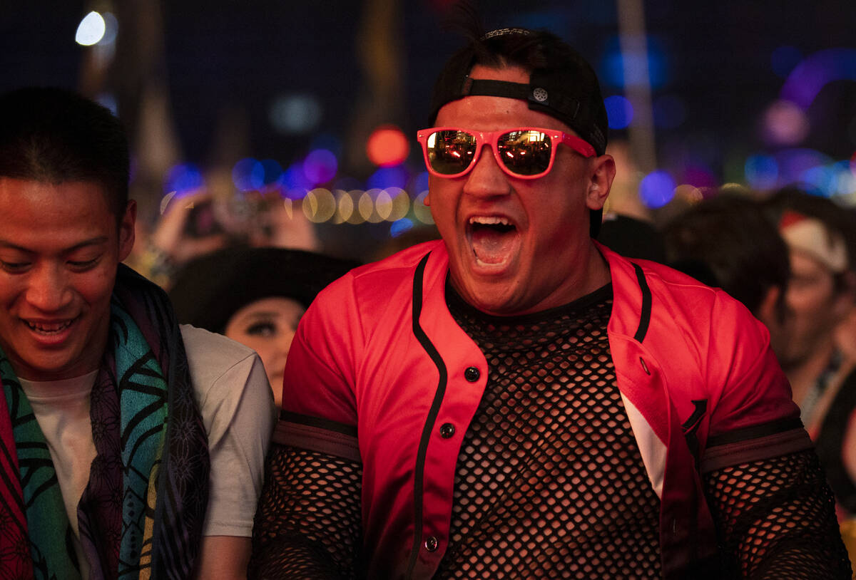 Attendees listen to music at Base Pod during day three of Electric Daisy Carnival on Sunday, Ma ...