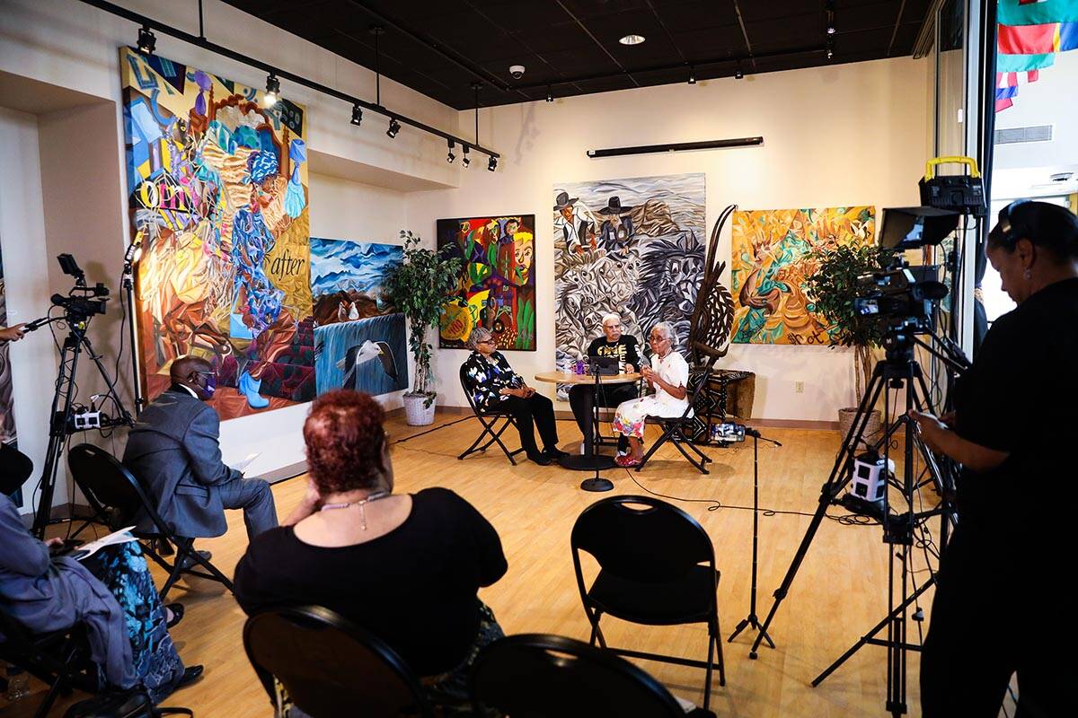 Ramon Savoy leads a conversation with Opal Lee, left, and Helen Anderson Toland, right, for th ...