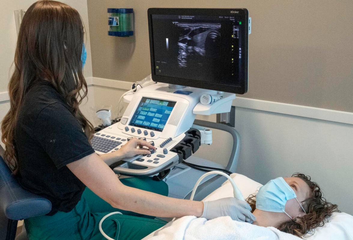 A technician performs an ultrasound on a patient. The Helmsley Charitable Trust announced $4.2 ...