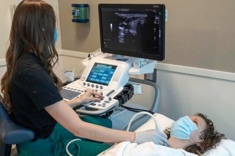 A technician performs an ultrasound on a patient. The Helmsley Charitable Trust announced $4.2 ...