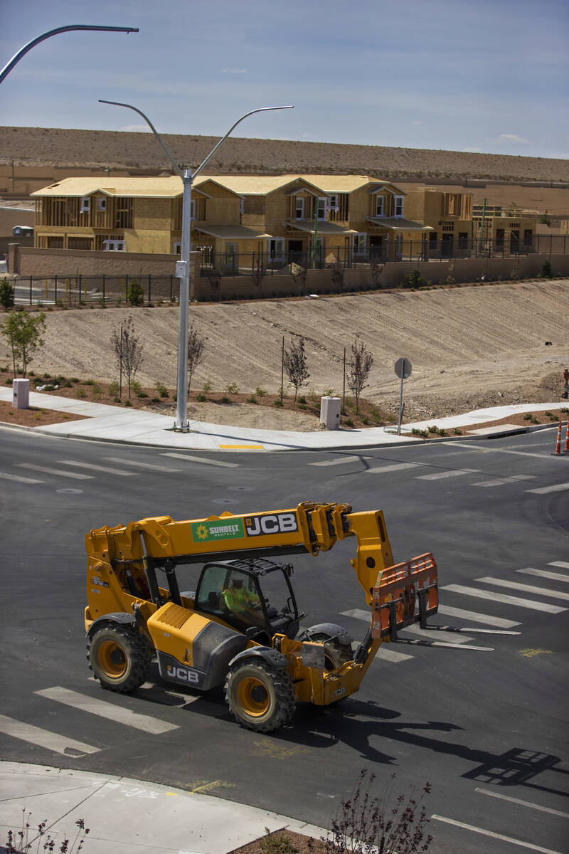 Construction continues on homes in the northwest Las Vegas Valley on Monday, May 23, 2022, in L ...