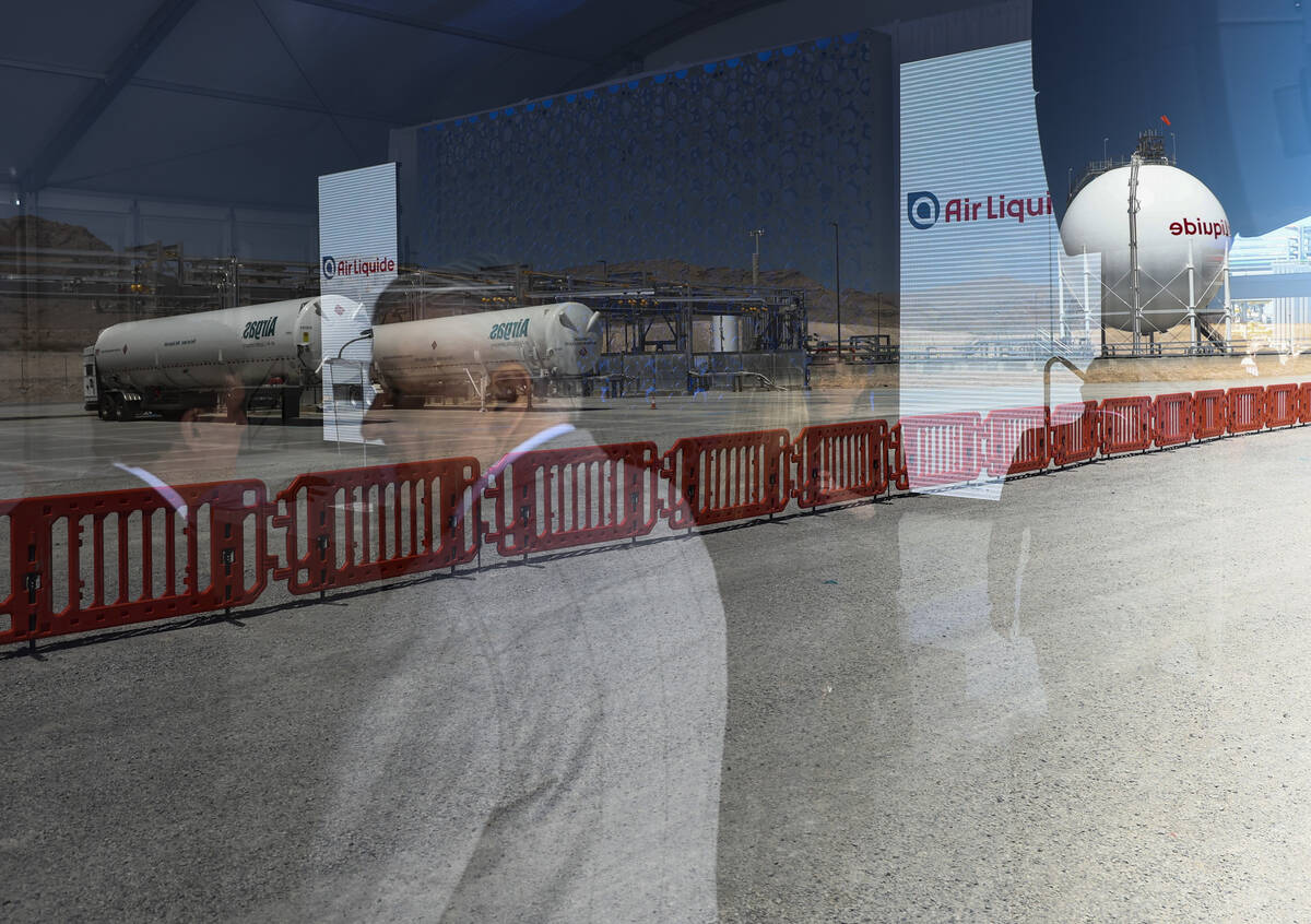 Gov. Steve Sisolak, left, is seen during the opening ceremony of the Air Liquide liquid hydroge ...