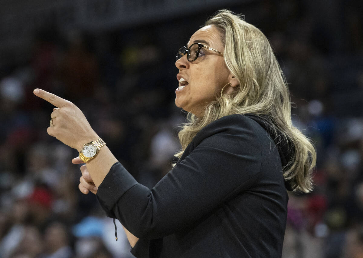 Aces head coach Becky Hammon directs her team in the first half during a WNBA basketball game a ...