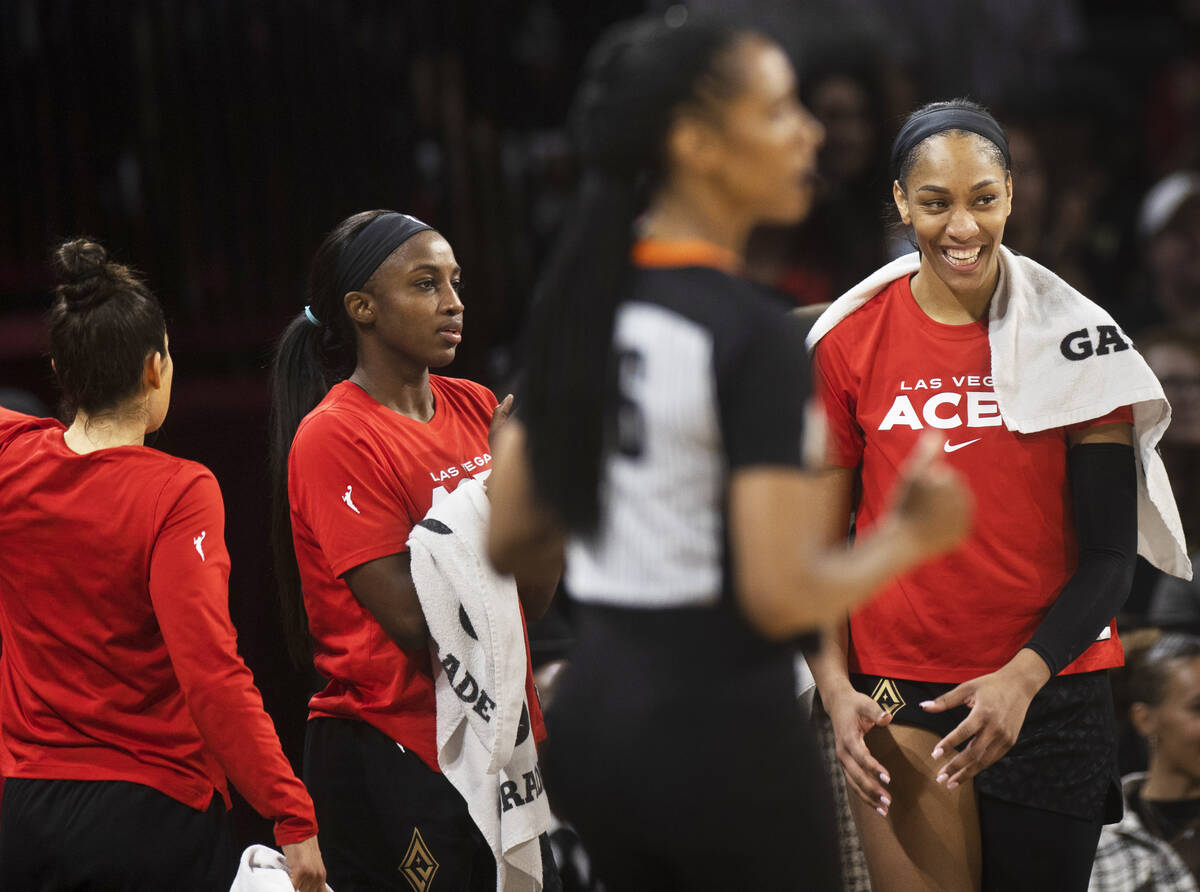 Aces forward A'ja Wilson (22) jokes around with teammates in the second half during a WNBA bask ...