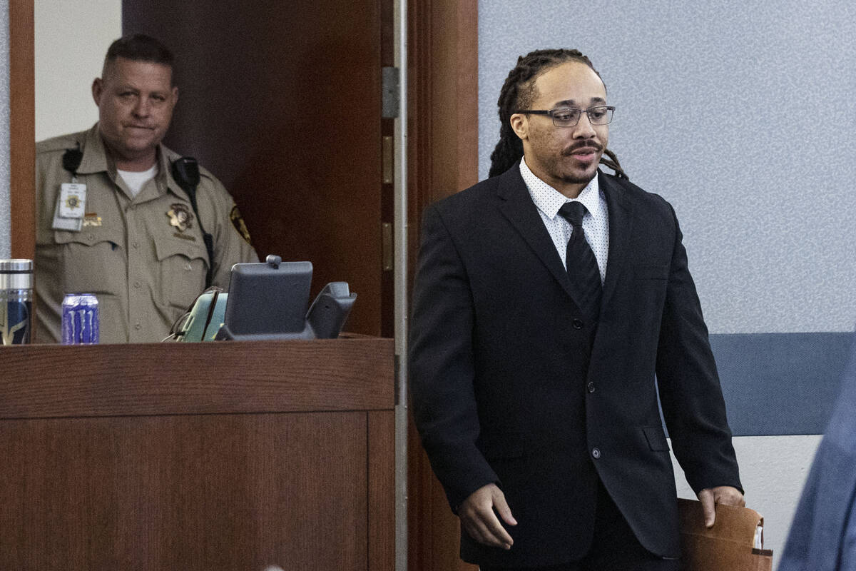 Michael Solid enters the courtroom to testify in his retrial at the Regional Justice Center on ...