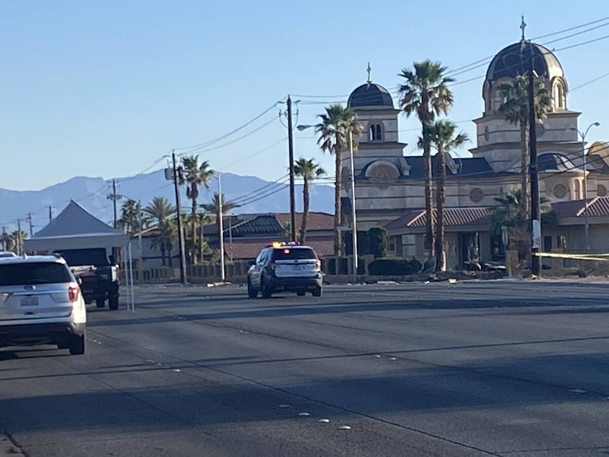A vehicle crash early Tuesday has killed two people and closed a central Las Vegas thoroughfare ...