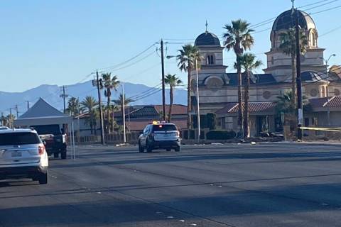 A vehicle crash early Tuesday has killed two people and closed a central Las Vegas thoroughfare ...
