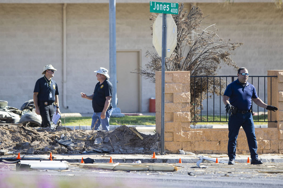Las Vegas police investigate a vehicle crash that killed two people near the intersection of Jo ...