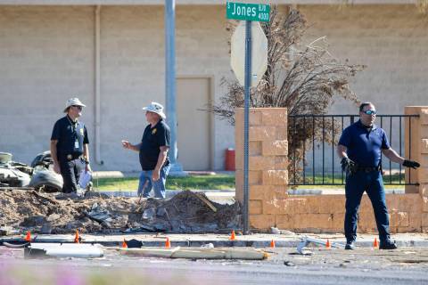 Las Vegas police investigate a vehicle crash that killed two people near the intersection of Jo ...