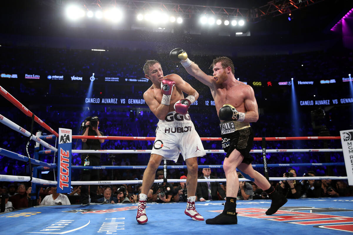 Gennady Golovkin, left, battles Saul "Canelo" Alvarez in the WBC, WBA, IBO, RING midd ...