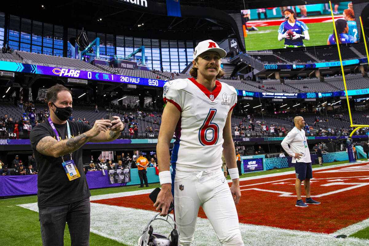 AFC punter AJ Cole of the Las Vegas Raiders (6) walks onto the field before the start of an NFL ...