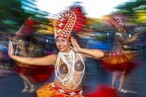 Zsalei Valdez dances during Lei Day, a new parade to celebrate and kick off Asian Pacific Ameri ...