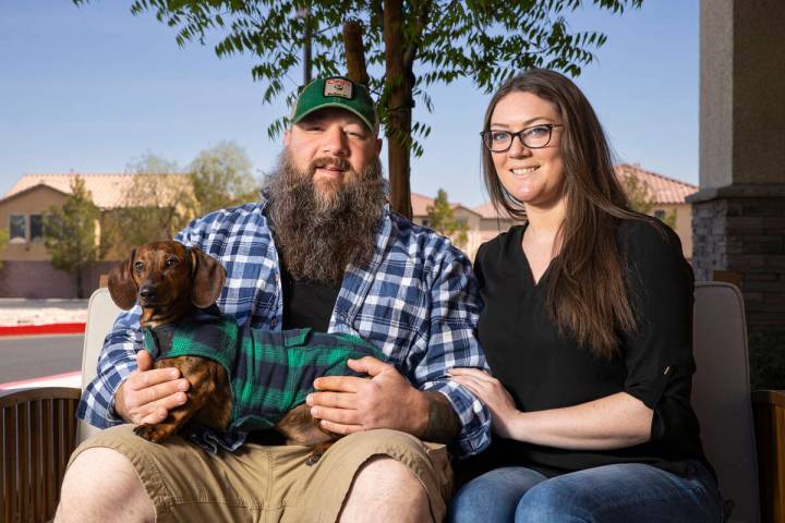 Ralph Perrazzo, founder of Snap-O-Razzo, poses for a portrait with fiancée Bailey Kirkpatrick ...