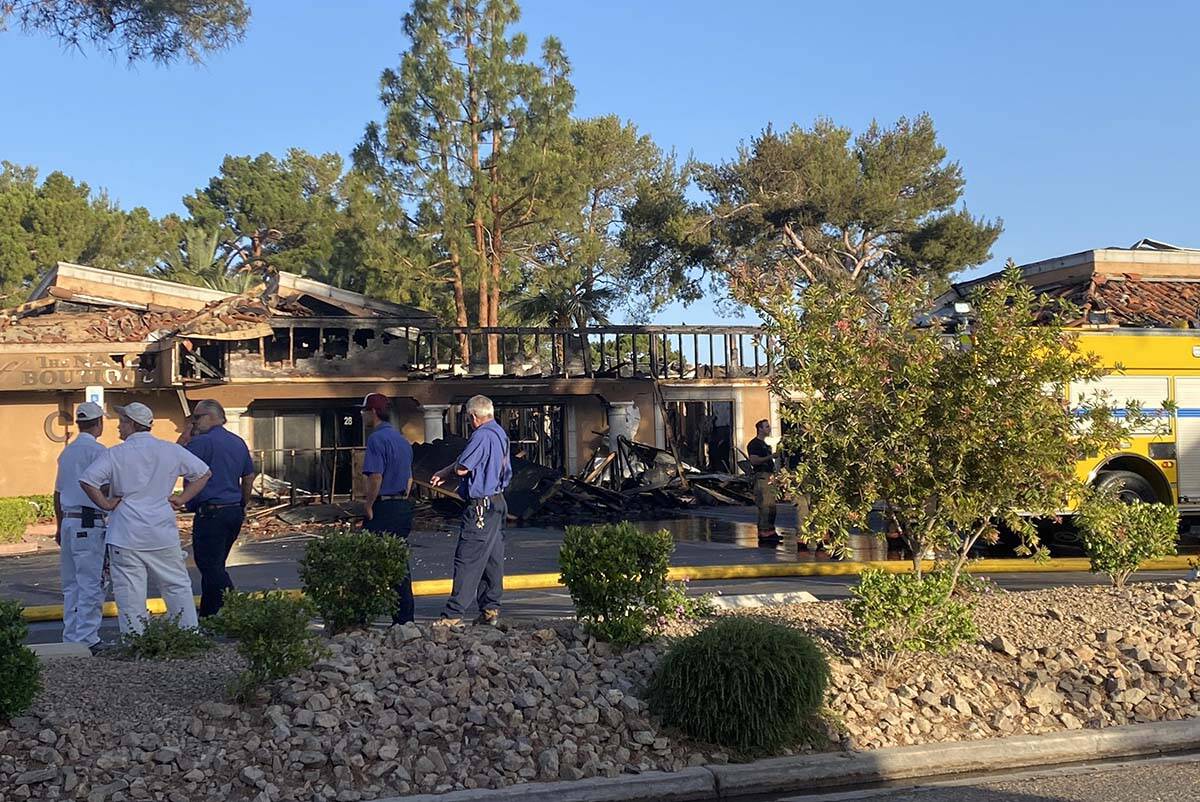 Fire caused heavy damage to a commercial business complex across from Sunset Park early Monday, ...