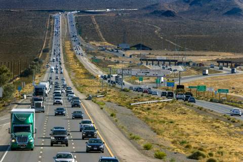 Holiday weekend traffic gets heavier at the state line as vehicles move northbound on Interstat ...