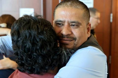 Ivan Arenas, father of Marcos Arenas, hugs his stepmother Anna Arenas after a guilty verdict in ...