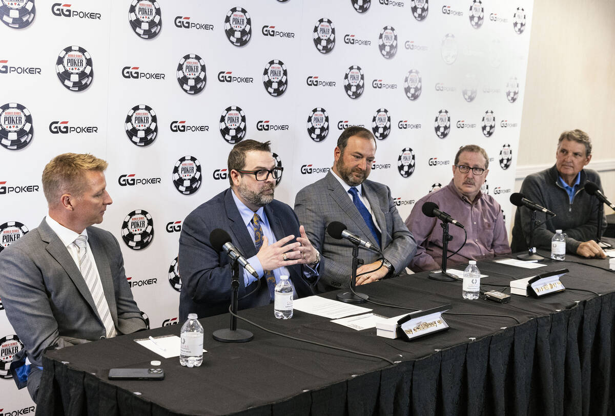 Jack Effel, vice president of WSOP, second left, speaks as Jason Gregorec, left, senior Vice Pr ...