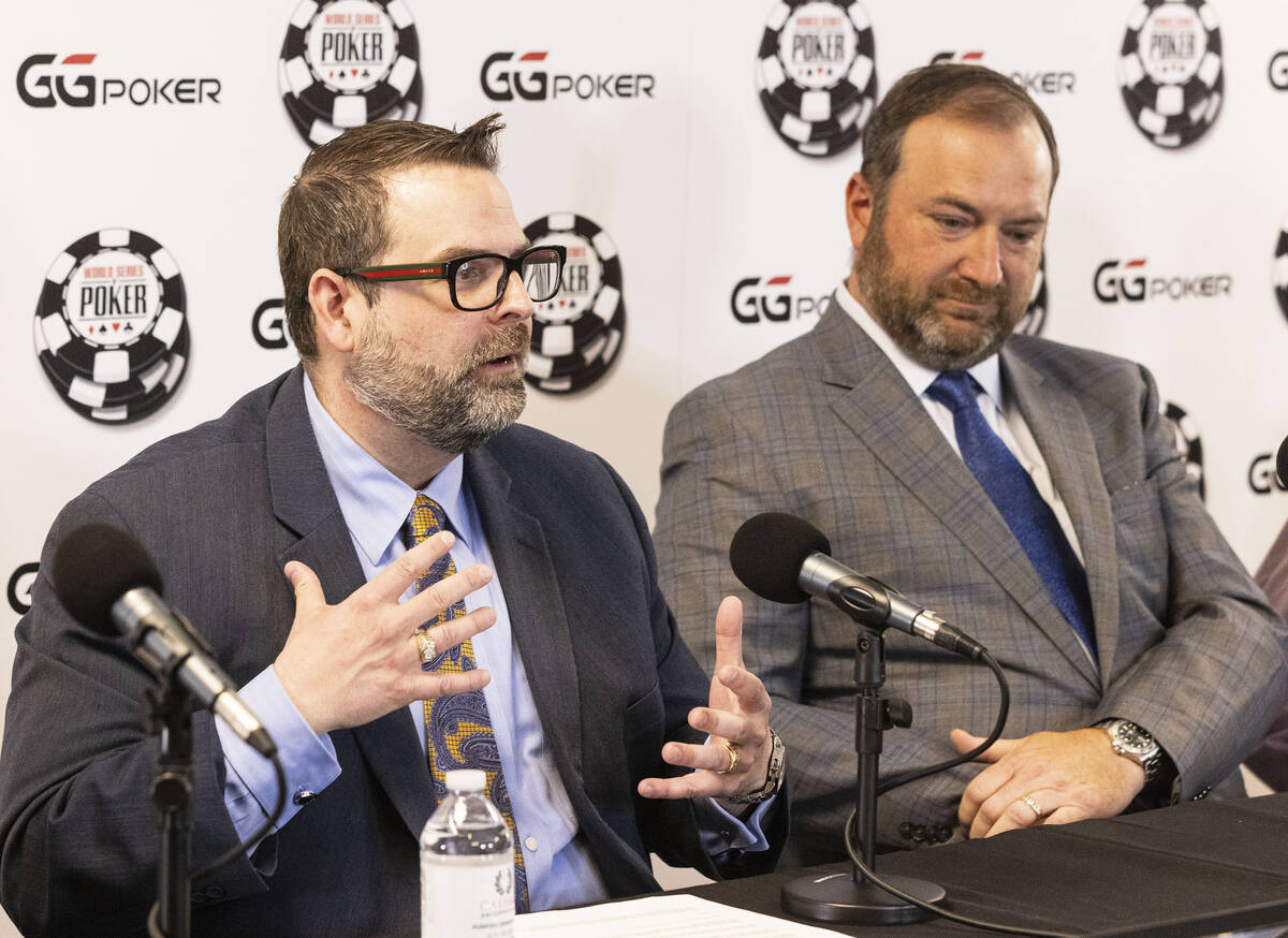 Jack Effel, vice president of WSOP, left, speaks as Ty Stewart, executive operation of WSOP, lo ...