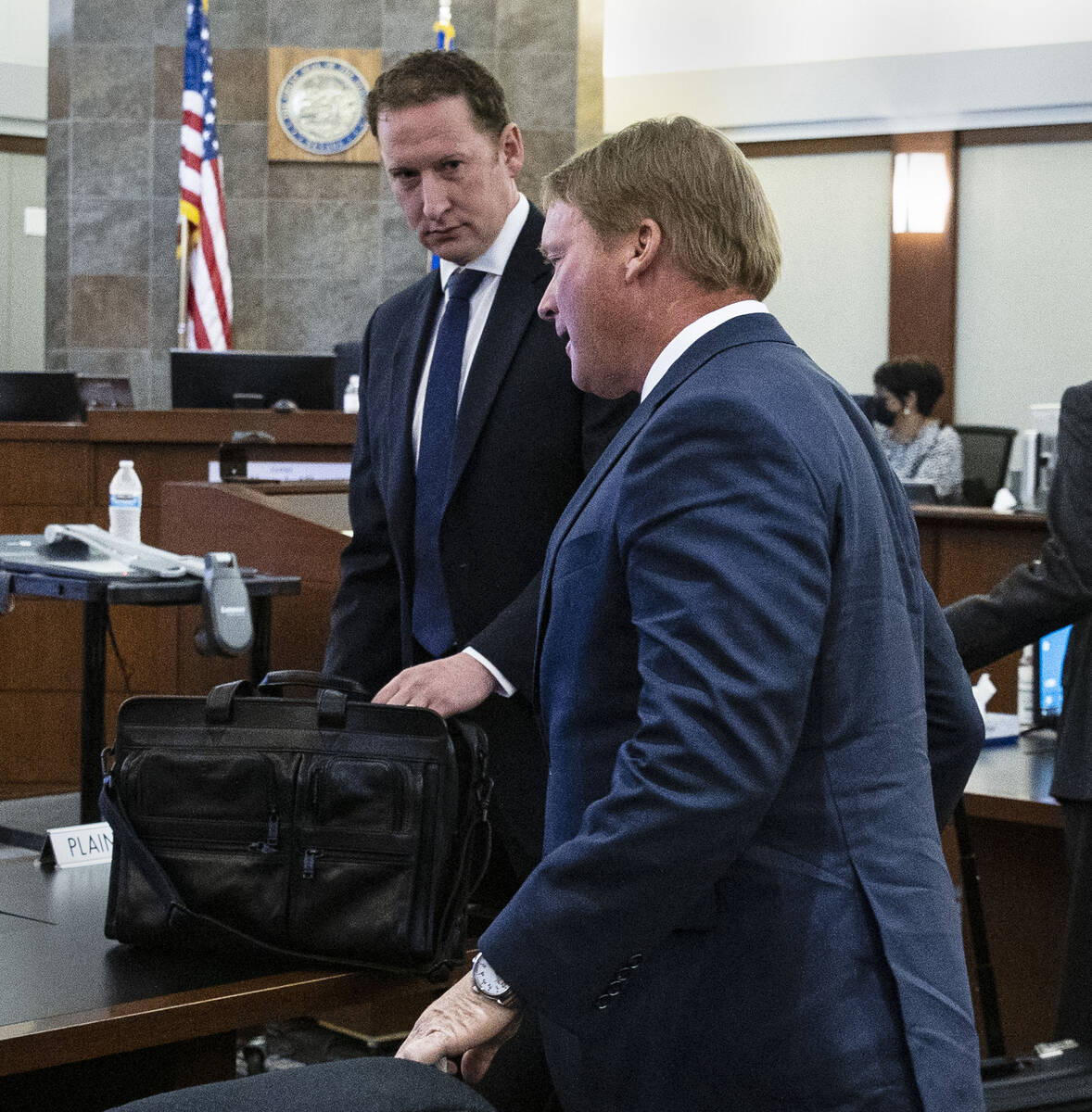 Former Raiders coach Jon Gruden and his attorney Adam Hosmer-Henner appear in court at the Regi ...