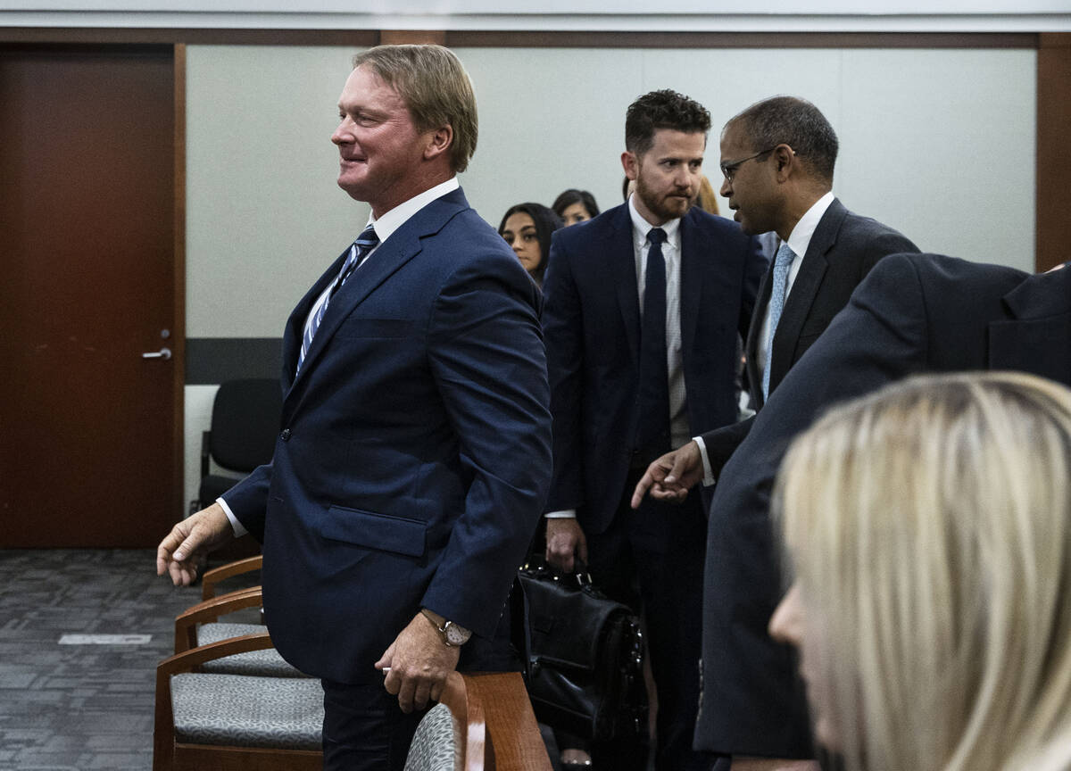 Former Raiders coach Jon Gruden, left, and defense attorney Kannon Kumar Shanmugam, right, repr ...
