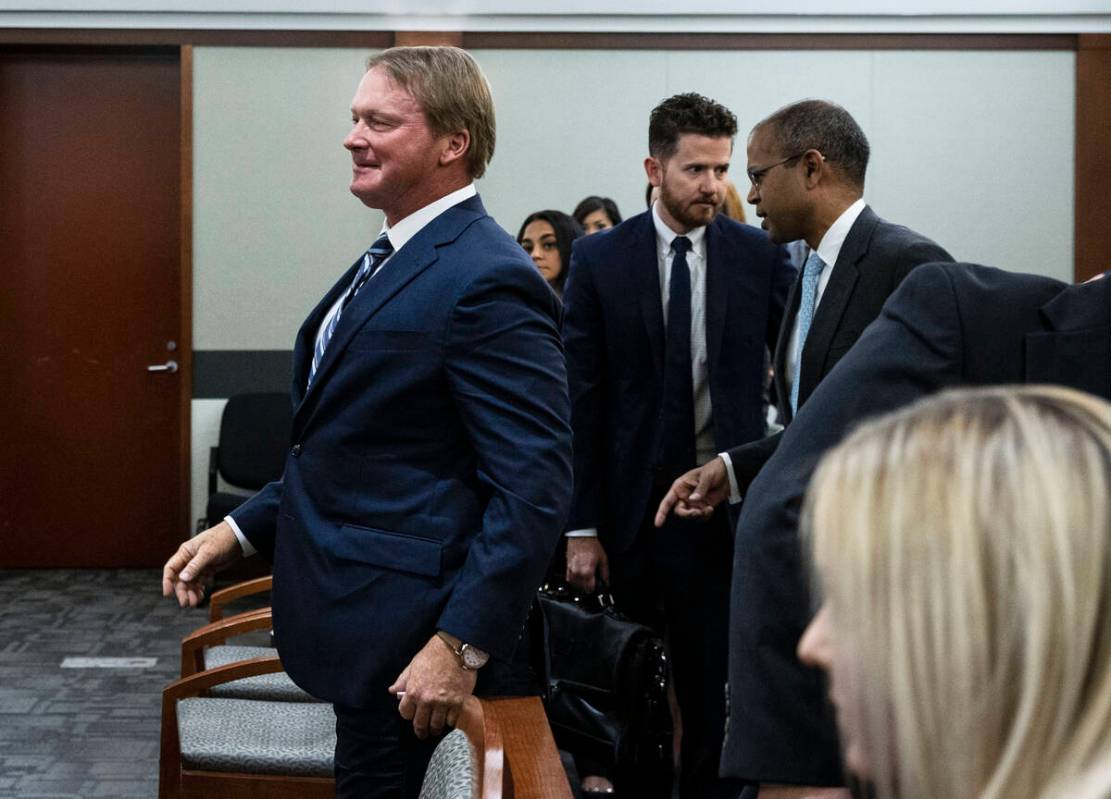 Former Raiders coach Jon Gruden, left, and attorney Kannon Kumar Shanmugam, right, representing ...