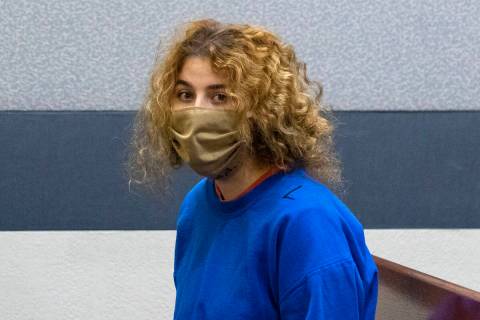 Sierra Halseth, charged in the killing of her father, Daniel Halseth, appears in court at the R ...