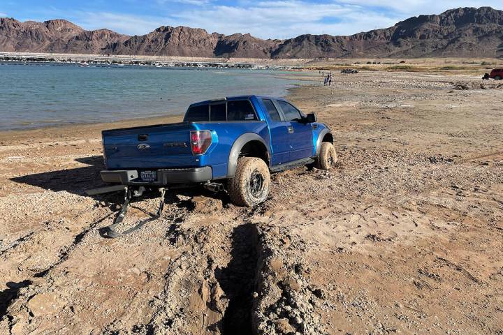 People, vehicles and vessels are getting stuck in newly exposed shoreline at Lake Mead National ...