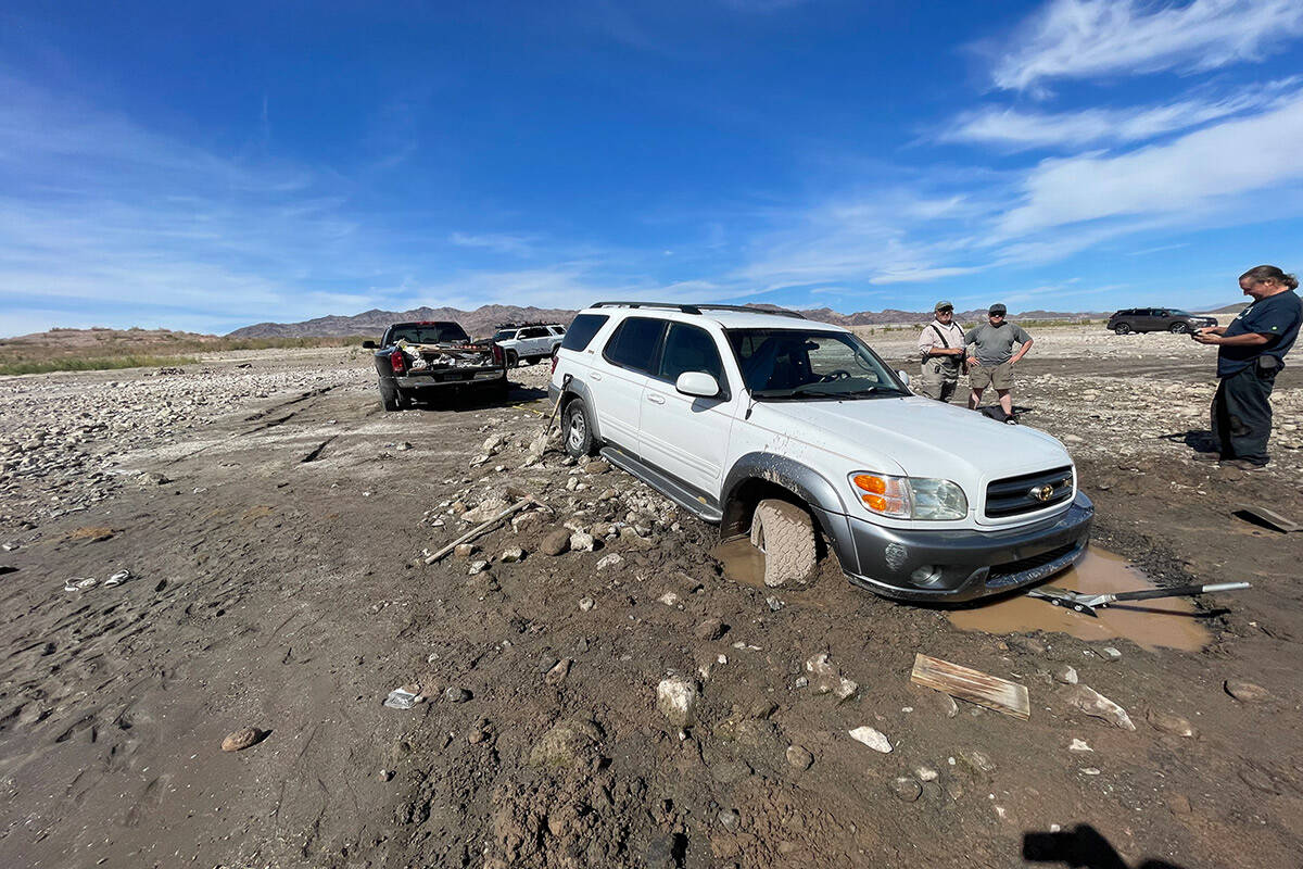 People, vehicles and vessels are getting stuck in newly exposed shoreline at Lake Mead National ...
