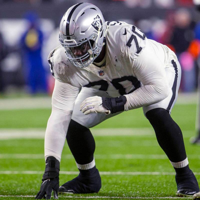 Raiders guard Alex Leatherwood (70) gets set for a play during the second half of an NFL playof ...