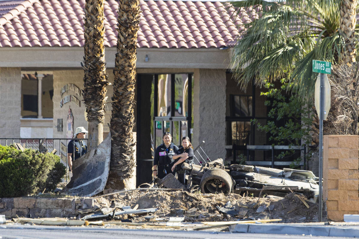 Las Vegas police investigate a vehicle crash that killed two people near the intersection of Jo ...