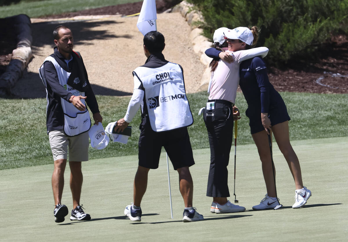 Gaby Lopez, right, embraces Chella Choi after Lopez defeated her at the 13th hole during the fi ...