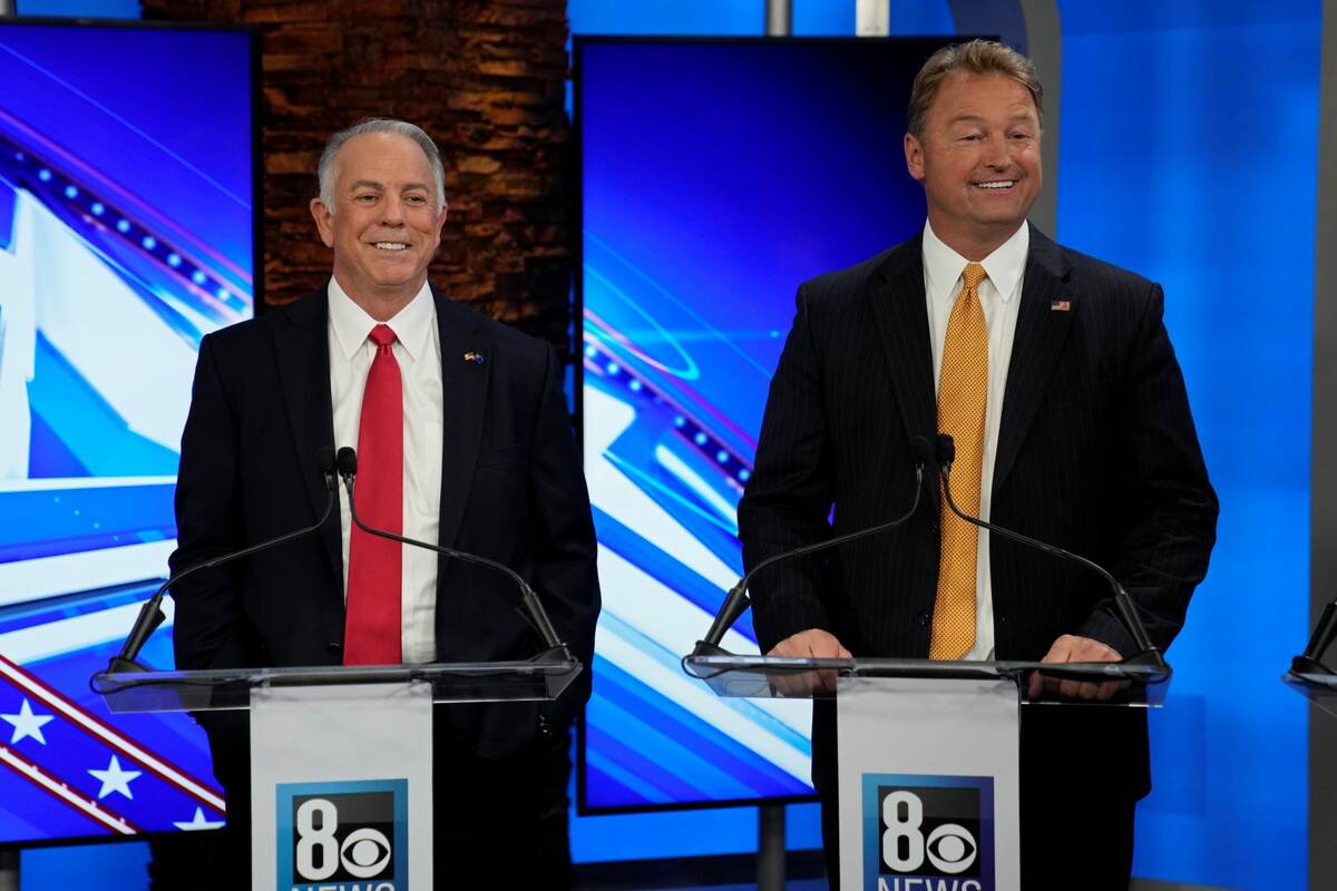 Clark County Sheriff Joe Lombardo, left, and former U.S. Senator Dean Heller laugh before a Rep ...